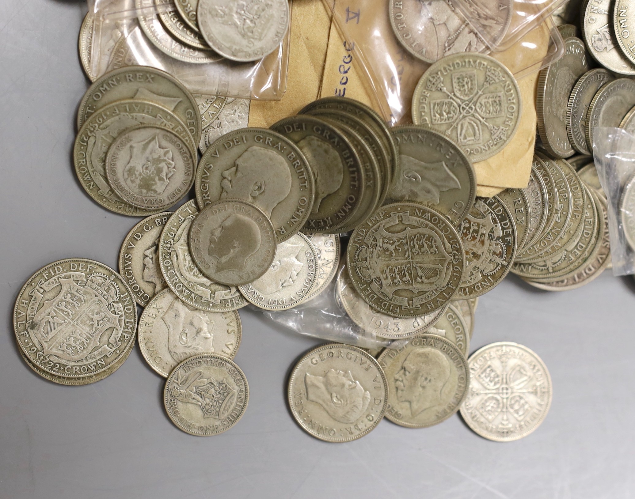 UK coins, a large collection of Victoria to George V silver and 50% silver half crowns, florins, shillings etc. , the majority post 1920 George VI half crowns